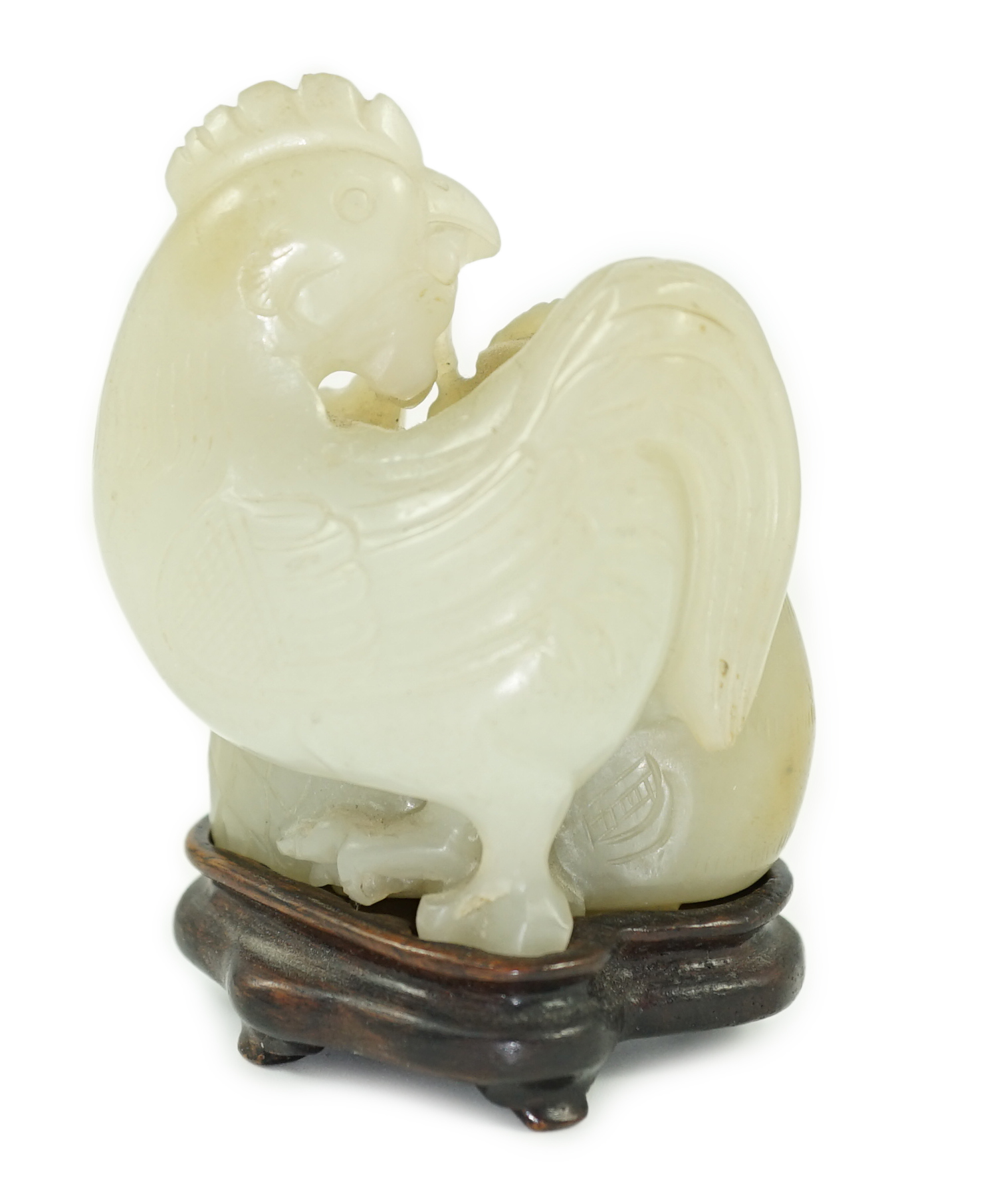 A Chinese pale celadon jade chicken group, 19th century, small faults